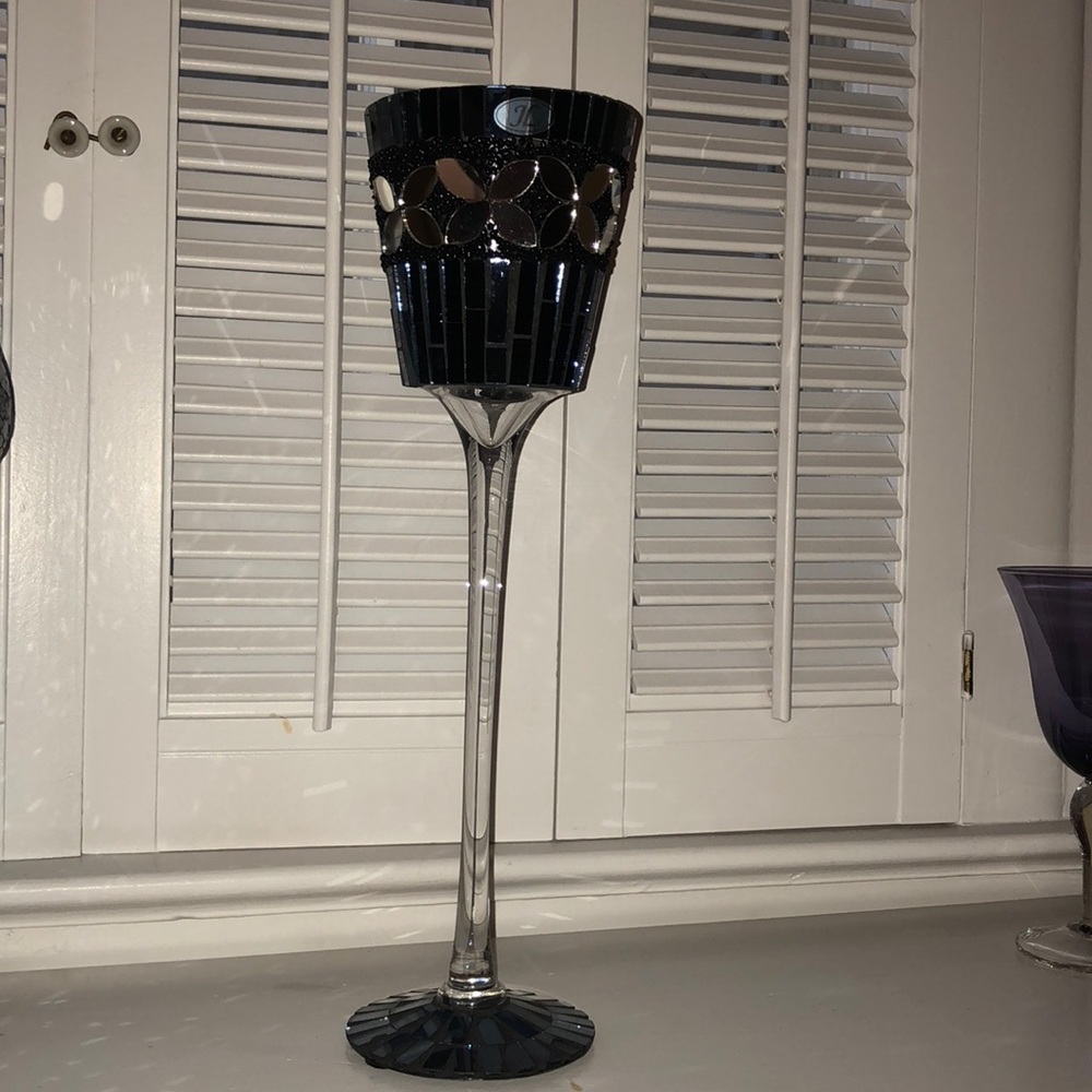 Tall black glass candle holder. Mirror detail
